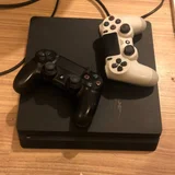 PlayStation 4 Slim (photo 1)