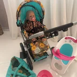 комплектом коляску, кукла беби Бон с бутылочкой и горшком, и стульчик для кормления (photo 2)