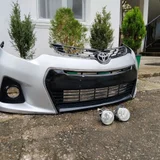 Передний бампер с решеткой и ПТФ для Toyota Corolla (photo 2)
