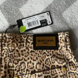 **Джинсы GUESS с леопардовым принтом** (photo 4)