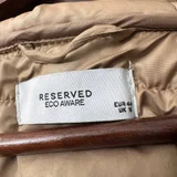 Куртка женская удлиненная с капюшоном,reserved, размер евр. 44, пойдет на 50-52. Золотистый цвет. В хорошем состоянии. На кнопках. (photo 2)
