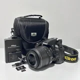 Зеркальный фотоаппарат Nikon D3100 + объектив 18-55mm VR (photo 1)