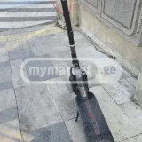 Электросамокат Ninebot — rifle, parking meter (photo 2)