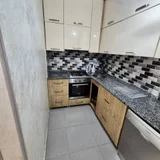3-комнатная квартира, 90 м² — microwave, dishwasher, stove (photo 2)