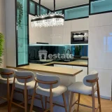 Стильная 2+1 квартира на Аллее Героев — dining table, home theater, restaurant (photo 3)