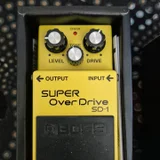 Гитарные педали эффектов Boss DS-1 Distortion и OverDrive — cellular telephone, stopwatch (photo 2)