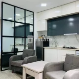 Уютная студия на Аллее Героев, Шартава 7 — home theater (photo 2)
