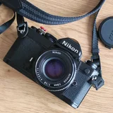 Плёночный фотоаппарат Nikon FM с объективом Nikkor AI-S 50mm F1.8 — reflex camera (photo 1)