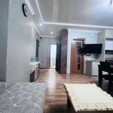 2-комнатная квартира 70 м2 — dining table, home theater, wardrobe (photo 1)