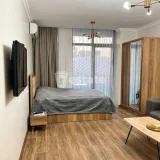 Студия в Bagrationi Residence — four-poster, studio couch (photo 1)