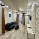 2-комнатная квартира, 75 м² — home theater, four-poster, studio couch (photo 2)