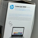 HP LaserJet MFP M141a — hand-held computer, modem, iPod (photo 2)