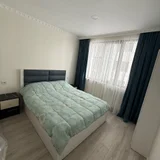 Квартира 1+1, 40 кв.м — four-poster, studio couch, quilt (photo 2)