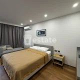 Студия в Blue Sky Tower — studio couch, home theater (photo 1)