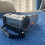 Sony Handycam DCR-SX44E — projector, Polaroid camera, lighter (photo 2)