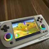 Игровая консоль Anbernic RG40XX H — hand-held computer, iPod, joystick (photo 1)