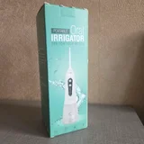 Ирригатор портативный с 7 насадками и чехлом — lotion, switch (photo 2)