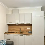 Студия в Bagrationi Residence — microwave (photo 3)
