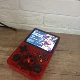 Портативная игровая консоль R36S — cellular telephone, remote control (photo 1)