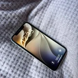 Apple iPhone 11 64GB — cellular telephone, iPod, sandal (photo 1)