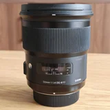 Объектив Sigma 24mm F1.4 HSM ART Nikon F — reflex camera, lens cap (photo 1)