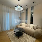 Стильная 2+1 квартира на Аллее Героев — studio couch, home theater, window shade (photo 1)