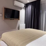 Студия с видом на море в Marina Club — home theater, theater curtain, studio couch (photo 5)