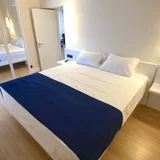 Квартира 2+1 в ORBI City — quilt, four-poster, studio couch (photo 4)