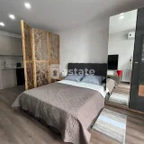 Студия в Bagrationi Residence — studio couch, four-poster (photo 2)
