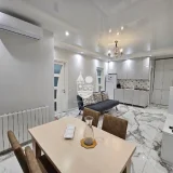 Сдача квартиры 1+1 — dining table, studio couch, home theater (photo 2)