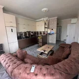 Квартира 2+1, 600$ — studio couch, home theater (photo 1)
