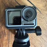 Экшн-камера DJI Osmo Action 1 — binoculars, tripod (photo 1)