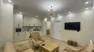 1+1 на ტბელ აბუსერიძის ქ. 49 Khimshiashvili District