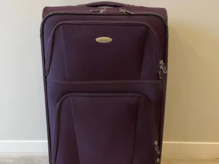 Большой чемодан **Samsonite**, размер L, высота без колесиков 70 см