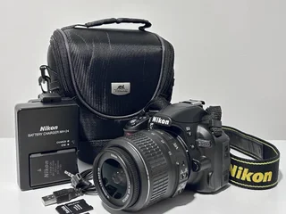 Зеркальный фотоаппарат Nikon D3100 + объектив 18-55mm VR