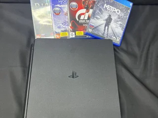 Игровая приставка PS 4 Slim 1TB с 2 геймпадами и 4 играми