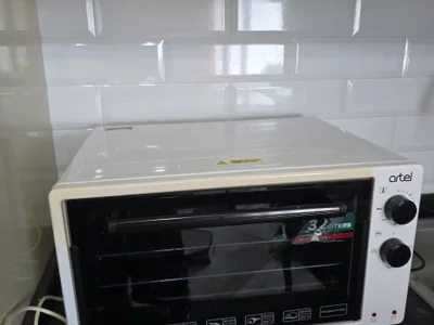 Духовка Artel