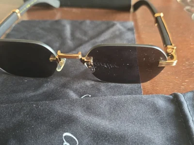 Солнцезащитные очки Cartier