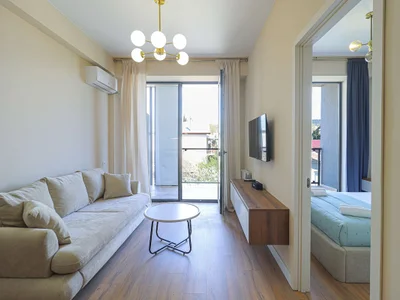 Современная 1-комнатная квартира в Garden Hills с балконом - Wehost