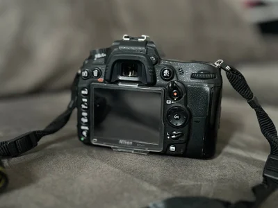 Фотоаппарат Nikon D7000 с объективом Sigma 50mm f/1.4 и аксессуарами