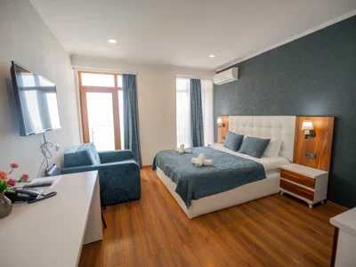 Квартир Студия в Aqua Blue Hotel