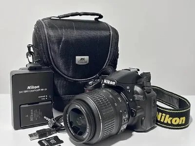 Зеркальный фотоаппарат Nikon D3100 + объектив 18-55mm VR