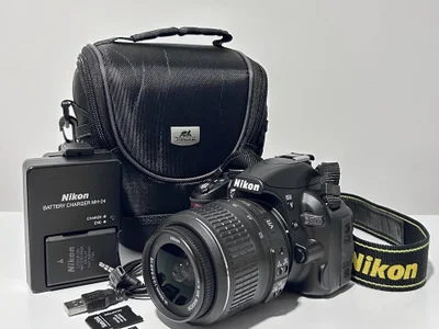 Зеркальный фотоаппарат Nikon D3100 + объектив 18-55mm VR