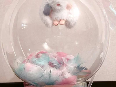 Игрушка в коробке с шаром