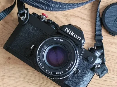 Плёночный фотоаппарат Nikon FM с объективом Nikkor AI-S 50mm F1.8
