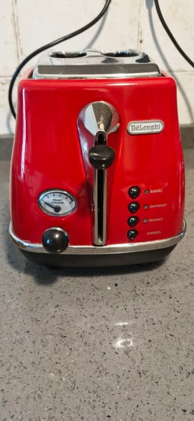 Тостер Delonghi