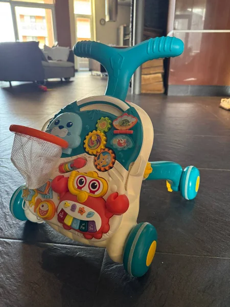 Детский развивающий игровой центр ходунки-каталка