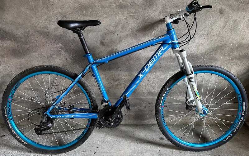 Велосипед серебристый 26"