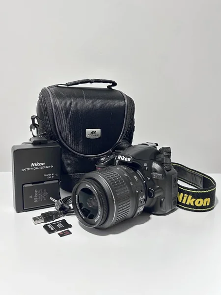 Зеркальный фотоаппарат Nikon D3100 + объектив 18-55mm VR