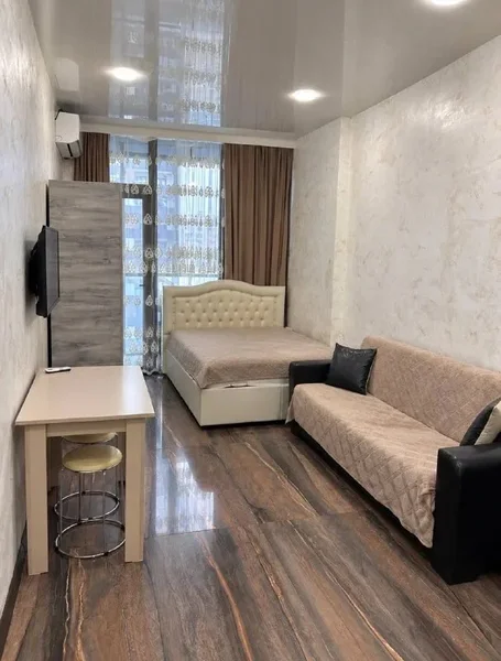Студия в Ramada Residences — studio couch, window shade